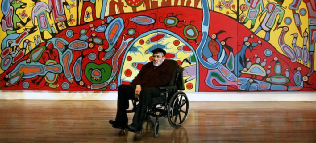 Photo of Norval Morrisseau in a wheelchair