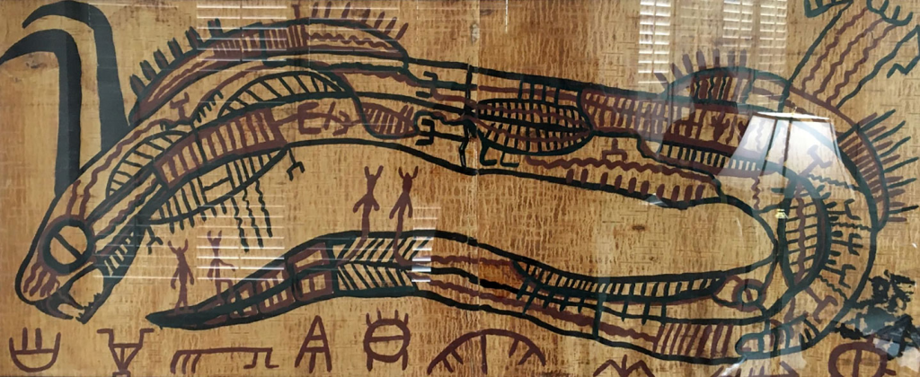 Peinture d'un serpent-médecine sur un rouleau d'écorce de bouleau